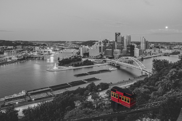 A ride car on the Duquesne Incline rises up Mt. Washington under the supermoon