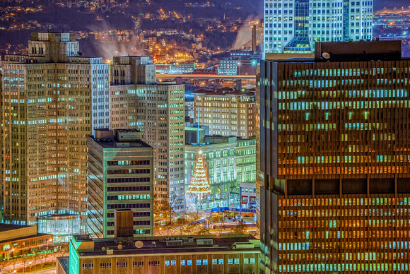 A Christmas tree is seen in downtown Pittsburgh at night from Mt. Washington HDR