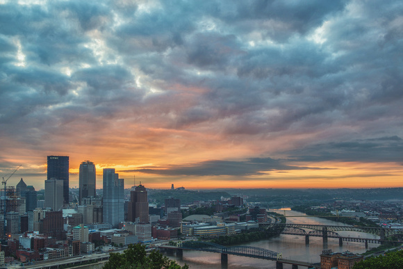Light coming through the clouds at dawn over Pittsburgh