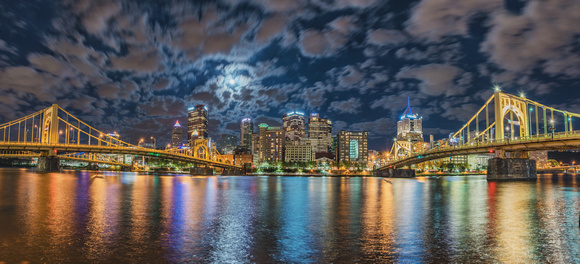 Panorama of the blue moon over Pittsburgh in the summer