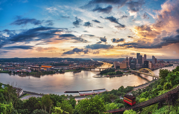 Panorama of a dramatic sunrise over the Duquesne Incline in Pittsburgh