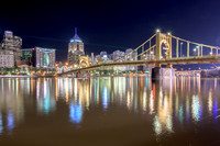 Colorful reflections of Pittsburgh and the Bat Signals