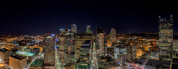 Panorama of Pittsburgh at night from the rooftops