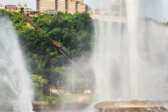 Incline cars on the Duquesne Incline seen through Point State Park Fountain