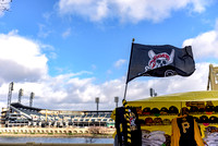 A Pirates flag waves by PNC Park on Opening Day 2016