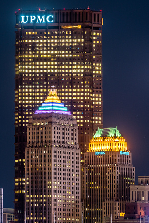 The Gulf Tower, Koppers Building and Steel Building glow in the night in Pittsburgh