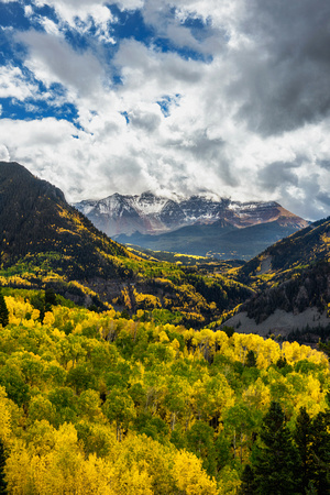 San Miguel Peak rises above the beautiful fall colors in Colorado