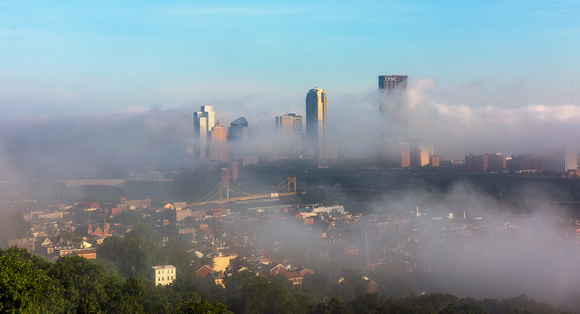 Pittsburgh is engulfed in fog in this view from the South Side Slopes