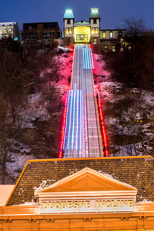 The Duquesne Incline streaks through the snow in Pittsburgh