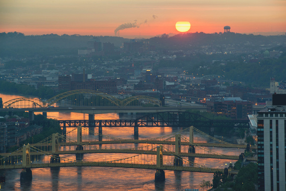 Red rivers and bridges at dawn in Pittsburgh