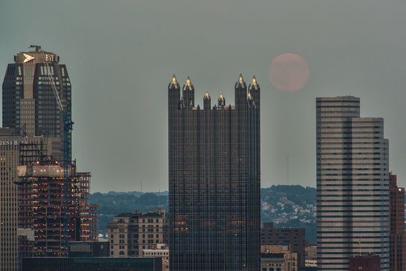 A faint Supermoon appears over Pittsburgh