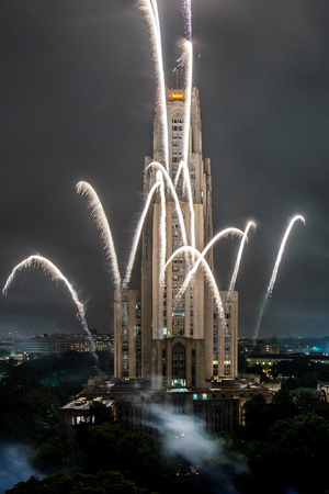 Fireworks go off from the Cathedral of Learning during homecoming 2016