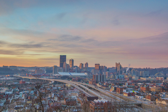 A colorful sky dawns over Pittsburgh from the North Side