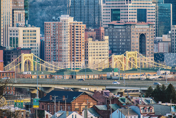 The Sister Bridges stand against the Pittsburgh skyline