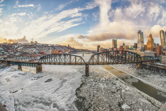 Fisheye view of the icy Monongahela River from the Liberty Bridge in Pittsburgh