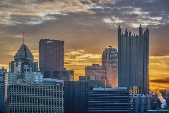 Light rays shining through Pittsburgh at dawn