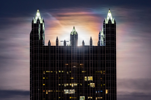 A full moon shines behind PPG Place in Pittsburgh