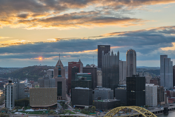 Glint of sun through the clouds from Mt. Washington over Pittsburgh
