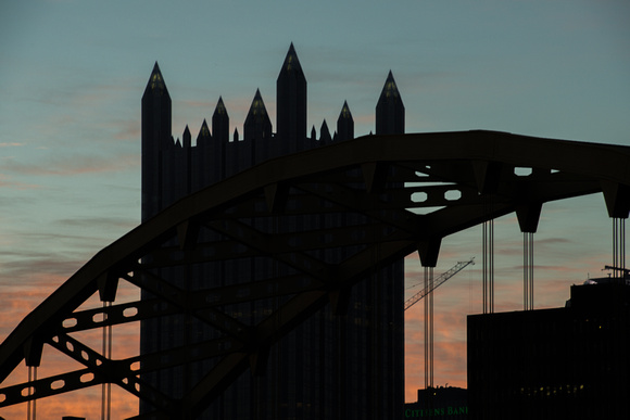 Silhouette of PPF Place and the Ft. Pit Bridge at sunrise