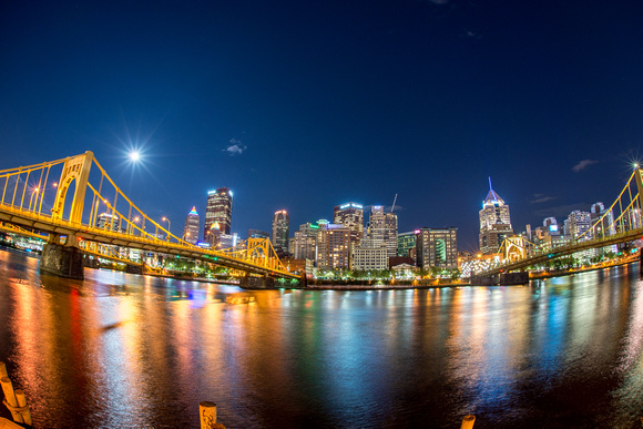 A fisheye view from the North Shore of the supermoon over Pittsburgh