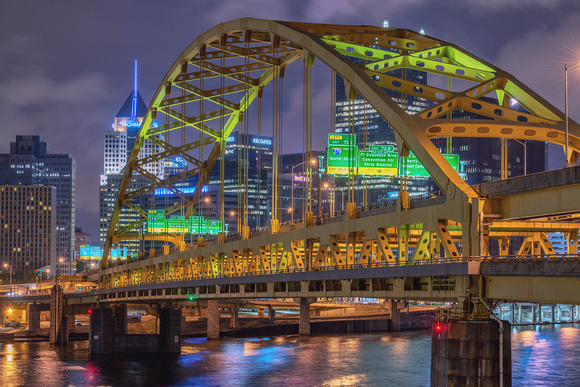 Pittsburgh skyline through the Ft. Pitt Bridge in the morning