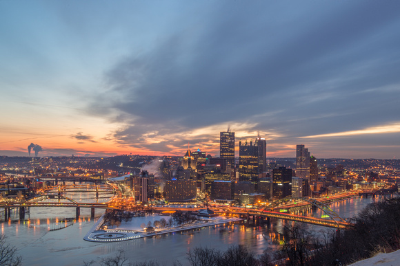 Long exposure of clouds rushing over the Pittsburgh skyline from Mt. Washington