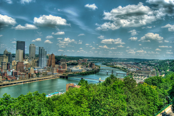Pittsburgh skyline up the Monongahela with clouds HDR