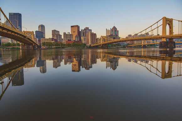 Reflections of the Pittsburgh skyline at dawn