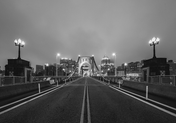 A black and white foggy morning on the Clemente Bridge