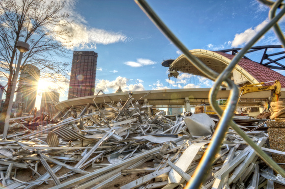 Sunflare through the fence at the demolition of the Civic Arena HDR