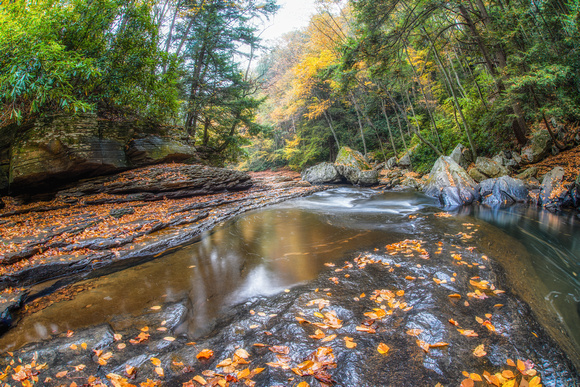 View looking down the natural rock slides at Ohiopyle State Park in autumn HDR