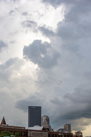 Clouds form over the Steel Building in Pittsburgh