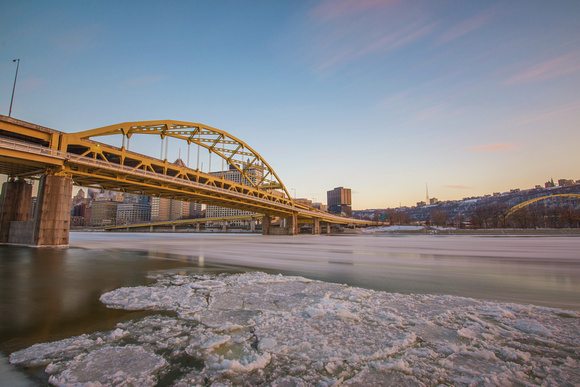 Long exposure of Pittsburgh as ice flows down the Allegheny River