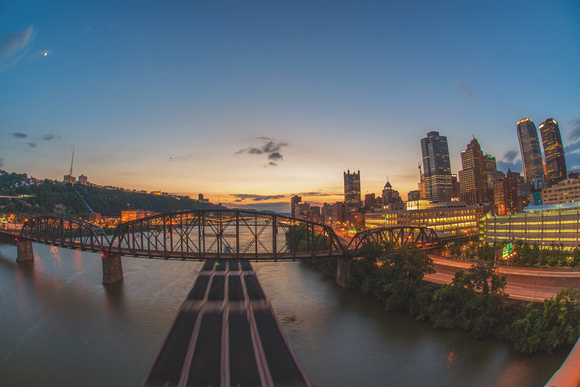 Fisheye view of Pittsburgh and a barge on the Monongahela River from the Liberty Bridge