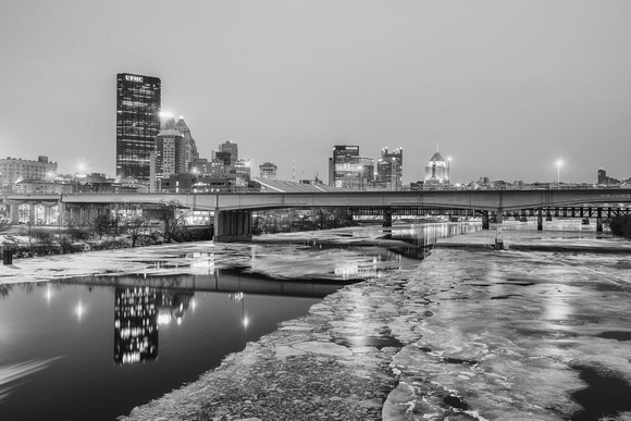 Pittsburgh from the 16th Street Bridge over an ice covered Allegheny River B&W