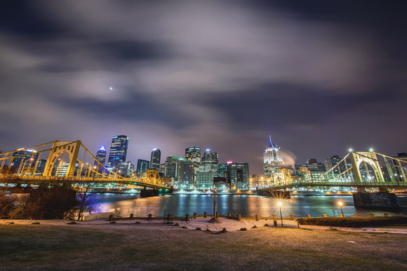 Clouds rush over the Pittsburgh skyline from the North Shore