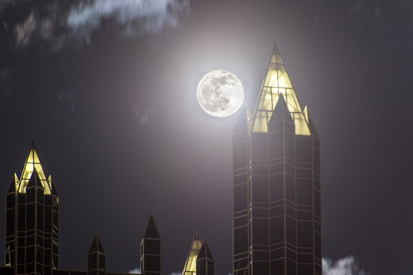 Full moon by the spires of PPG Place in Pittsburgh
