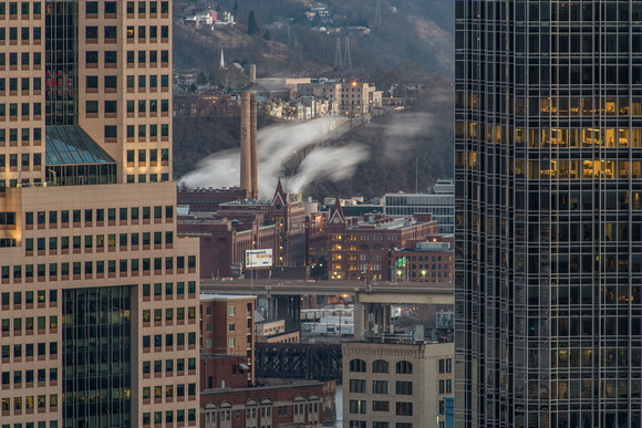 A view of the Heinz Plant through the Pittsburgh skyline