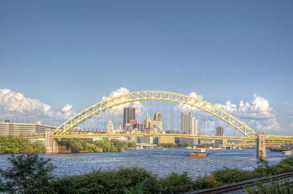 Pittsburgh skyline and a barge through the West End Bridge HDR
