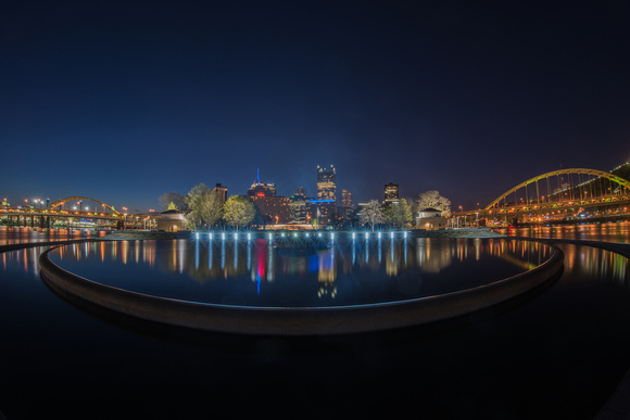 Pittsburgh skyline reflecting in the fountain before dawn