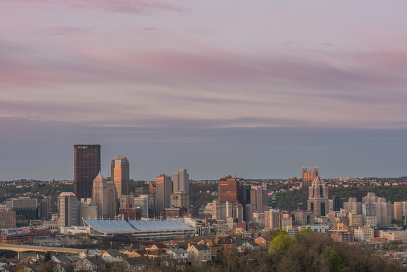 Downtown Pittsburgh glows at dawn from Spring Hill