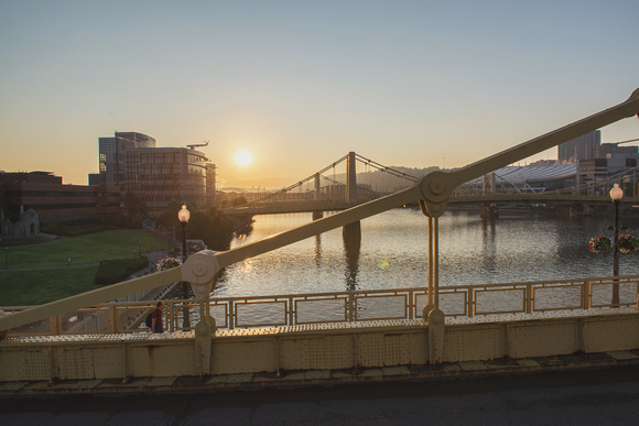 The sun rises over the Allegheny River in Pittburgh