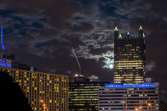 The supermoon behind clouds near PPG Place in Pittsburgh
