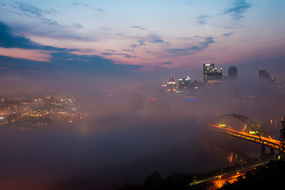 Pittsburgh is enveloped by fog before dawn