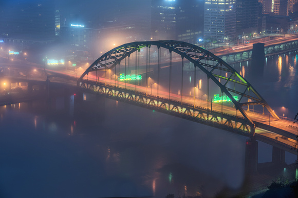 Fog surrounds the Ft. Pitt Bridge in Pittsburgh