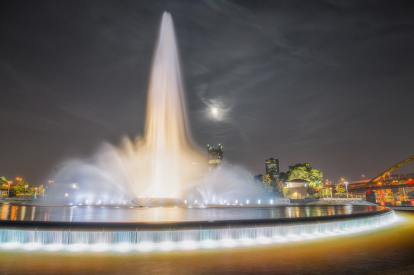 The moon and the fountain at Point State Park in Pittsburgh