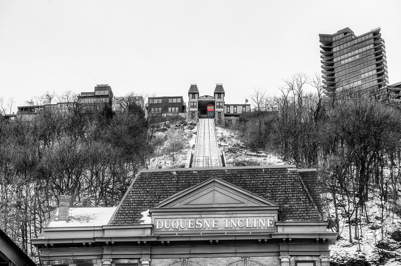 Car at the top of the snow covered Duquesne Incline Station in Pittsburgh B&W