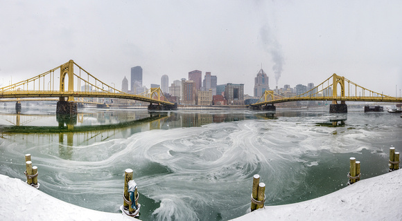 Panorama of a snowy and ice covered Allegheny River in Pittsburgh