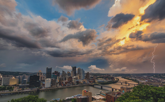 Lightning strikes Pittsburgh during a beautiful summer sunset