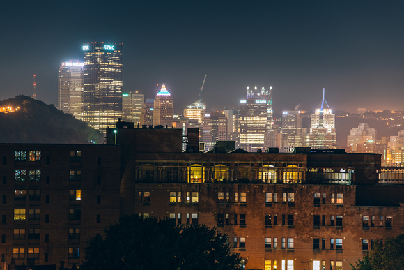 Pittsburgh skyline over buildings of Lawrenceville